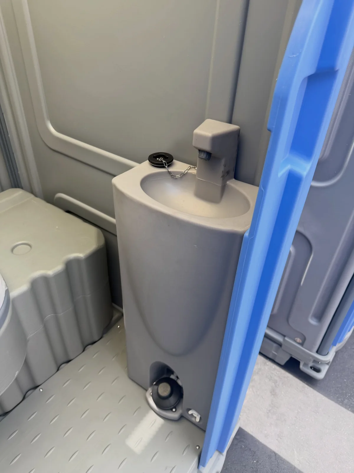 Handwashing sink inside a portable toilet