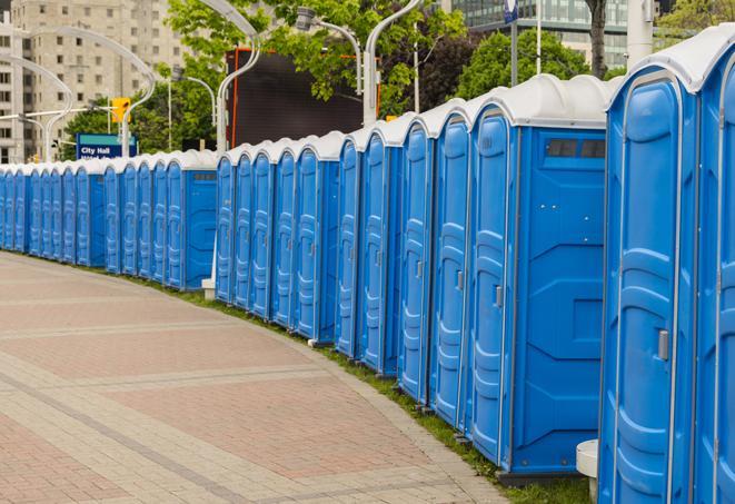 a row of portable restrooms set up for a special event, providing guests with a comfortable and sanitary option in Littlerock, CA